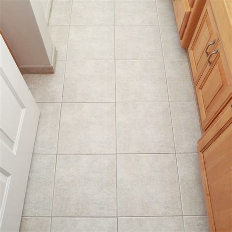 Of course, the painting coincided with some unusually high humidity for this time of year so the floor was a bit sticky the next day, but seemed to harden after another full 24 hours. Refresh Your Outdated Tile With Paint! in 2020 | Painting ...