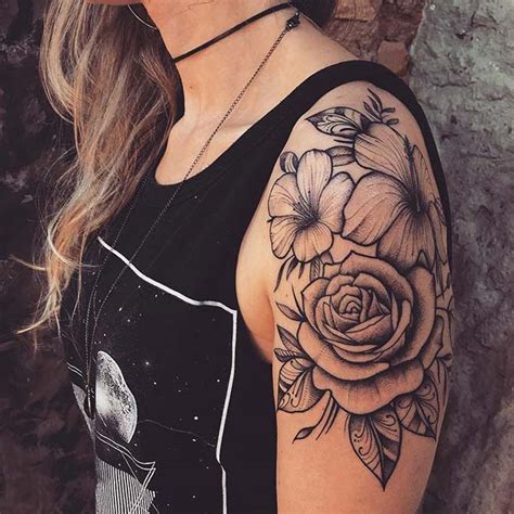 The full sleeve arm tattoos for girls are dense and distinctive, resonating as a floral motif. 21 Rose Shoulder Tattoo Ideas for Girls - Women Style Blog