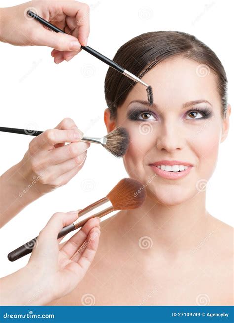 Three Hands Applying Cosmetics On The Woman S Face Stock Image Image Of Brunette Fashion