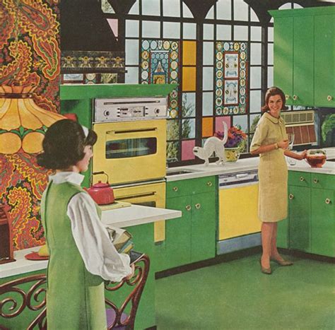 Tasteful monet style artwork on the lower doors. amazing late 60's kitchen...love the wallpaper and apple ...