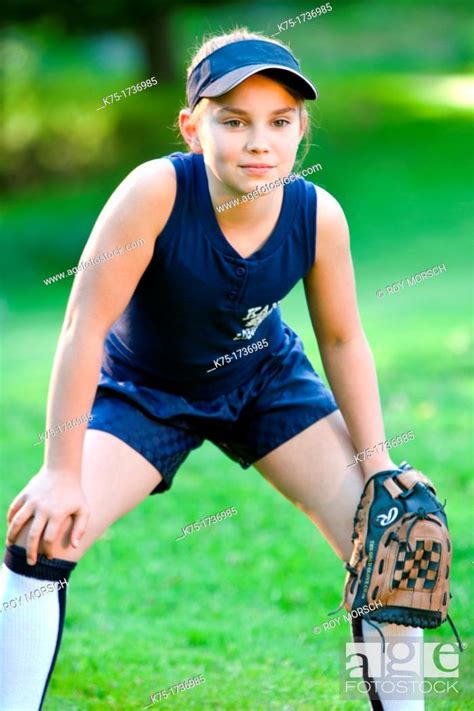 Young Softball Player Ready To Catch Ball Stock Photo Picture And