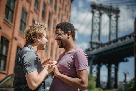 Men Holding Hands And Looking At Each Other · Free Stock Photo