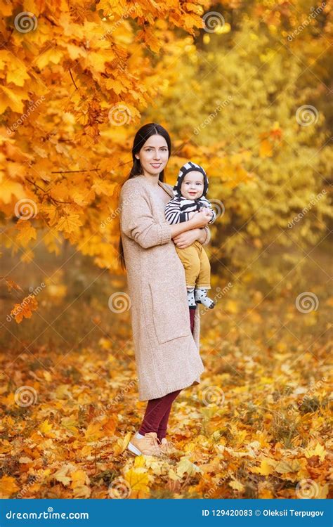 Mother With Son In Autumn Park Stock Image Image Of Together Women