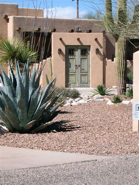 Toned down and neutral colors reminiscent of sand, wood and clay work well on this style of home. Tucson | Spanish style homes, Mission style homes, Santa ...