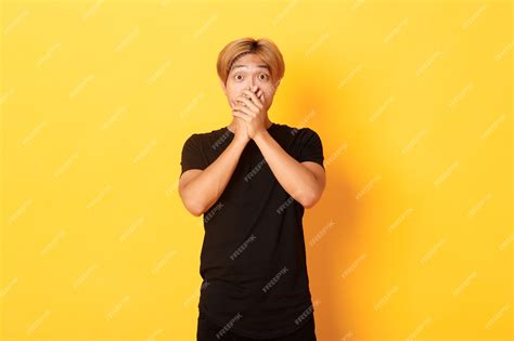 Premium Photo Portrait Of Surprised Gasping Asian Guy With Blond Haircut