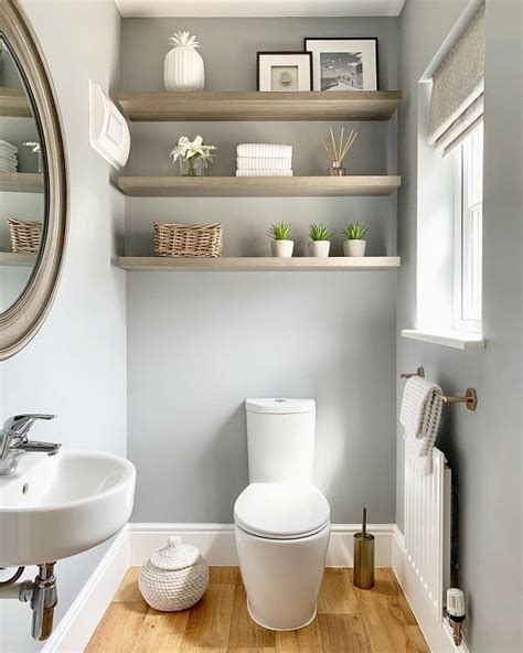 How To Decorate A White Powder Room Shelves Leadersrooms