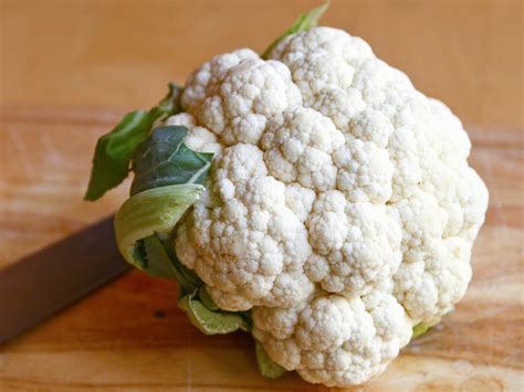 Add the head of cauliflower, cut side down. Hey Chef, What Can I Do With Cauliflower? | Serious Eats