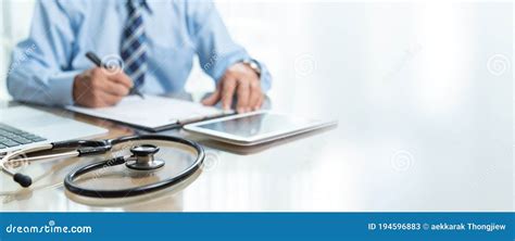 Focus On Stethoscope Doctor Writing On Prescription Banner Stock