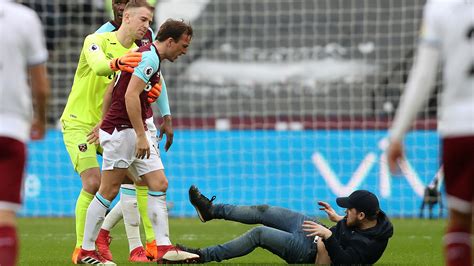 West Ham Pitch Invasion Furious Fans Fight With Players Over Burnley Embarrassment
