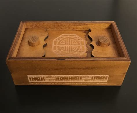 I tried googling for some ideas for a locking mechanism, and came across a reverse geocaching box which was invented by mikal hart (whom i didn't know at the time, but i later became friends with. puzzle box with a Chinese vintage look and a rather tricky ...