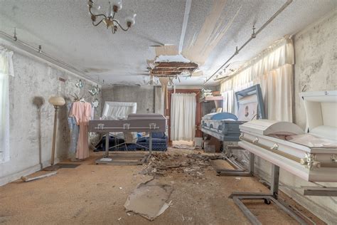 Abandoned Funeral Home With Caskets Hearse And Cremated Remains Left