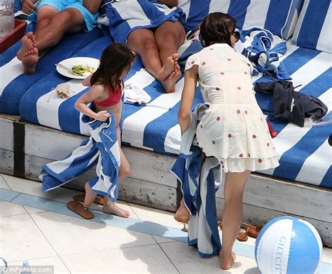 Celebrity Stars Katie Holmes And Daughter Suri Have A Ball Poolside As They Celebrate Tom