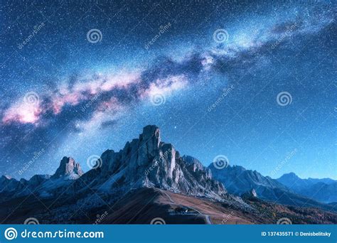 Milky Way Above Mountains At Night In Autumn In Dolomites Italy Stock