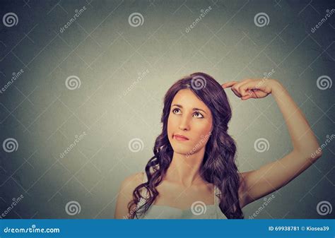 Young Woman Scratching Head Thinking Daydreaming Deeply About Something Looking Up Royalty Free
