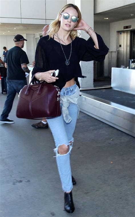Candice Swanepoel In Ripped Jeans 26 Gotceleb