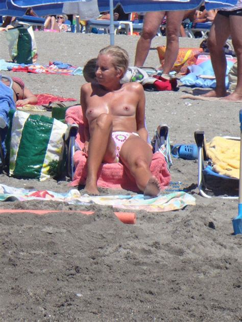 Topless Blonde Relaxing Well At Beach July 2014 Voyeur Web Hall Of