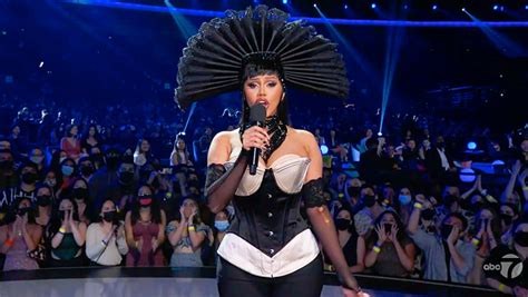 cardi b at amas 2021 see photos of all her hosting outfits hollywood life