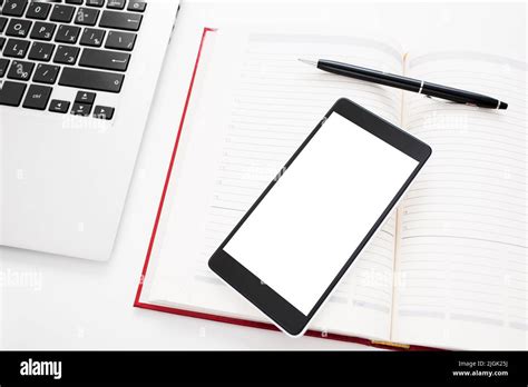 Smartphone With Blank Screen On Office Stuff Stock Photo Alamy