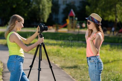 Two Girls Teenager Girlfriend Summer In Nature Writes The Video To The Camera In Sunglasses