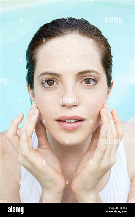 Young Woman Touching Her Face Portrait Stock Photo Alamy