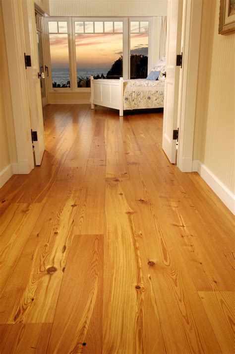 reclaimed heart pine floors  oceanfront bedroom