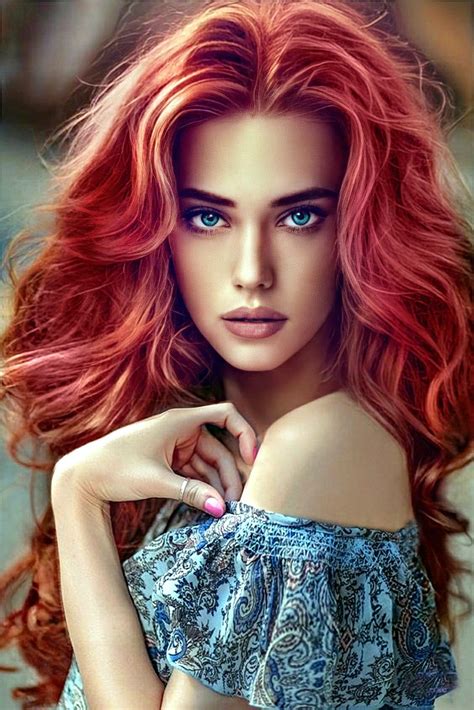 A Woman With Long Red Hair And Blue Eyes Posing For A Magazine Cover