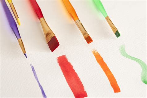 Free Stock Photo 12144 Four Different Paintbrushes And Paintstrokes