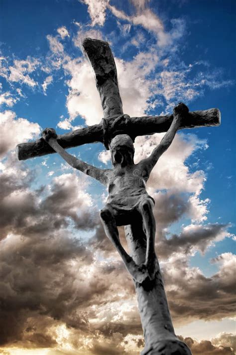 Jesus Christ On The Cross With Dramatic Sky Behind Him Stock Image