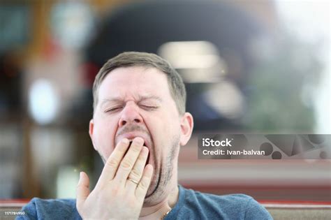 Exhausted Sleepy Male Yawning Facial Portrait Stock Photo Download