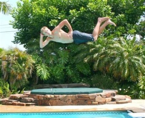 Funny Photos Of Mid Air Poses Above The Pool Fun