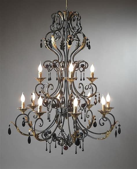 Lowe's little lamps paired with the hand forged iron arms make a cute chandelier that would be greatly appreciated by the. 12 Best of Large Iron Chandelier