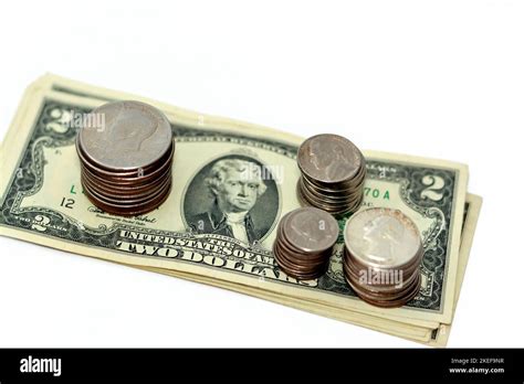 Pile of American dollars cash money banknote papers of different values