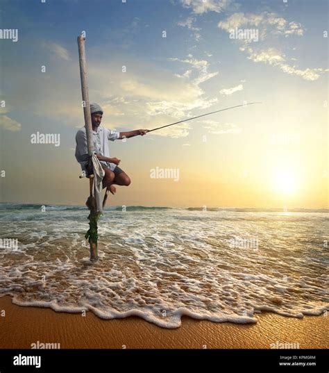 Fisherman At Sunset Stock Photo Alamy