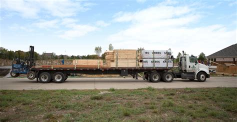 Lumber Delivery Truck At Jobsite Forest Lumber Company