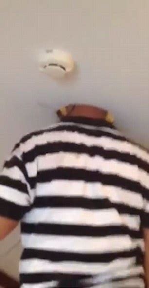 Video Shows An Electrician Get His Head Stuck In Hole In Ceiling