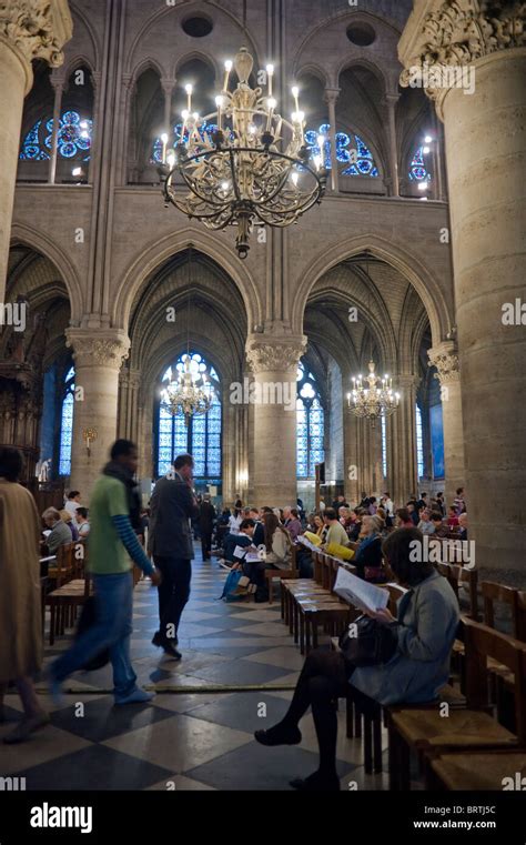 Paris France People Praying At Traditional Catholic Mass Inside