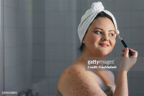 curvy woman bathroom photos and premium high res pictures getty images
