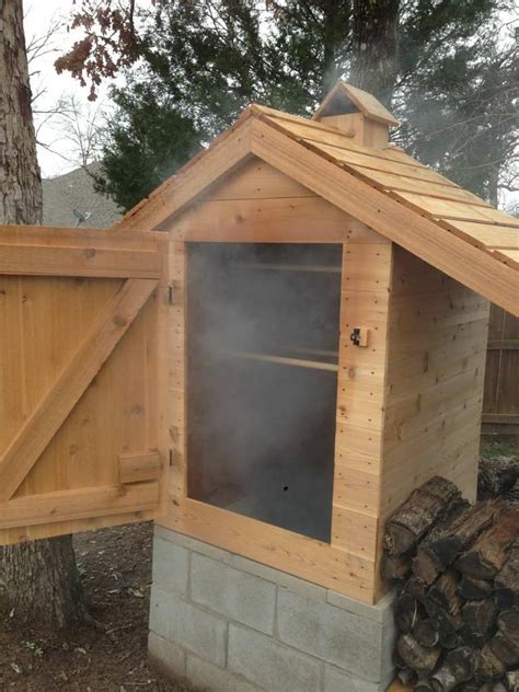 Home smoking your food is a great way of locking in delicious flavors. Cedar smokehouse construction | Smokehouse, Diy outdoor ...