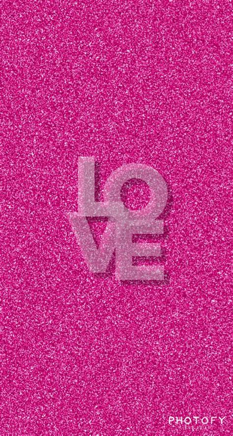 The Word Love Is Written In White On A Pink Background