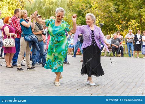 Elderly People Are Dancing On The Dance Floor In The Park Editorial