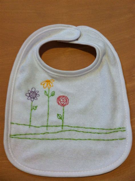 A plain baby bib I purchased and hand embroidered. | Hand embroidered, Baby bibs, Embroidered