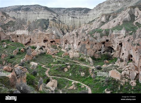 Ancient Cave Dwellings Carved Into The Stone Formations At Outdoor