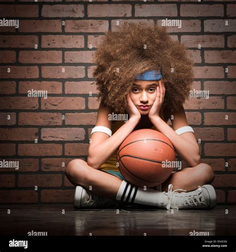 Female Basketball Player With An Afro Stock Photo Alamy