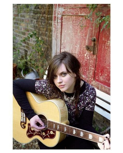 Amy Macdonald A Scottish Singer Songwriter Guitarist And Recording Artist Playing Her