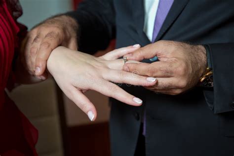 Wedding Hands Of A Bride And Groom Groom Put A Ring On Finger Of His
