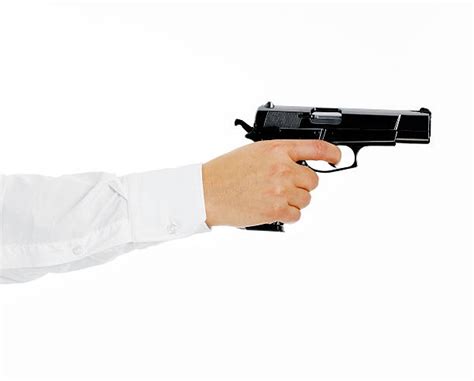 Top Hand Holding Gun Stock Photos Pictures And Images Istock