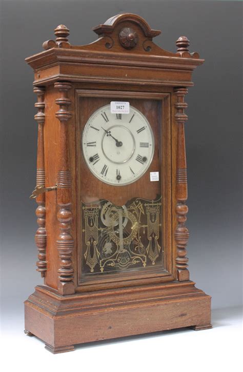 A Late 19th Century American Walnut Mantel Clock With Eight Day