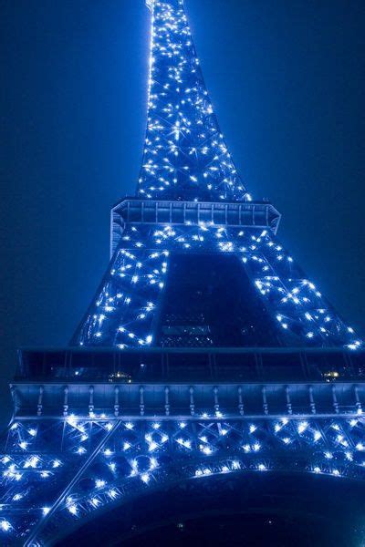 The eiffel tower is an iron tower built on the champ de mars beside the river seine in paris. Pin by Amy Harmeier on Cobalt Blue | Blue aesthetic ...