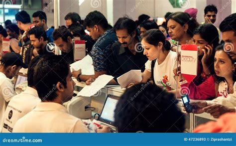 Gathering Of People In Registration Counter Editorial Stock Photo