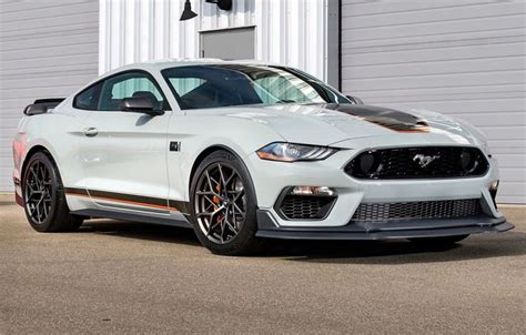 Mach 1 models featuring the available appearance package ($1,000) are the easiest to spot, with exclusive fighter jet gray paint, orange accents inside and out, orange brake calipers, and an ebony/orange interior to boot. Mustang Mach 1 2021 - Edição especial que virá ao Brasil ...